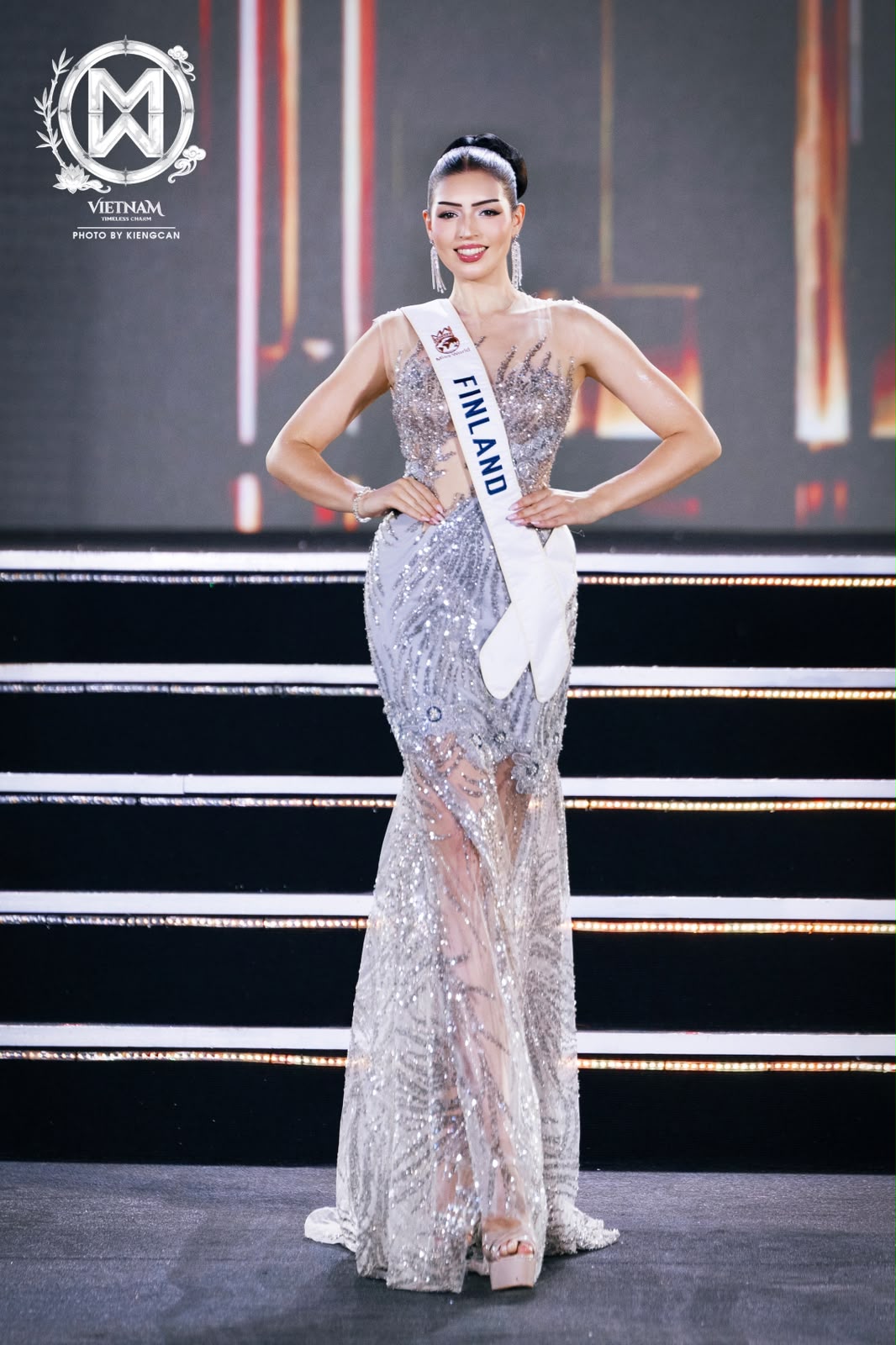 Kiia Huutoniemi on the 75th Miss World stage in Vietnam wearing the Finland sash